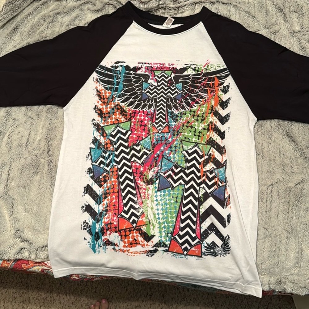 Raglan shirt with crosses. Brand new. Never worn.